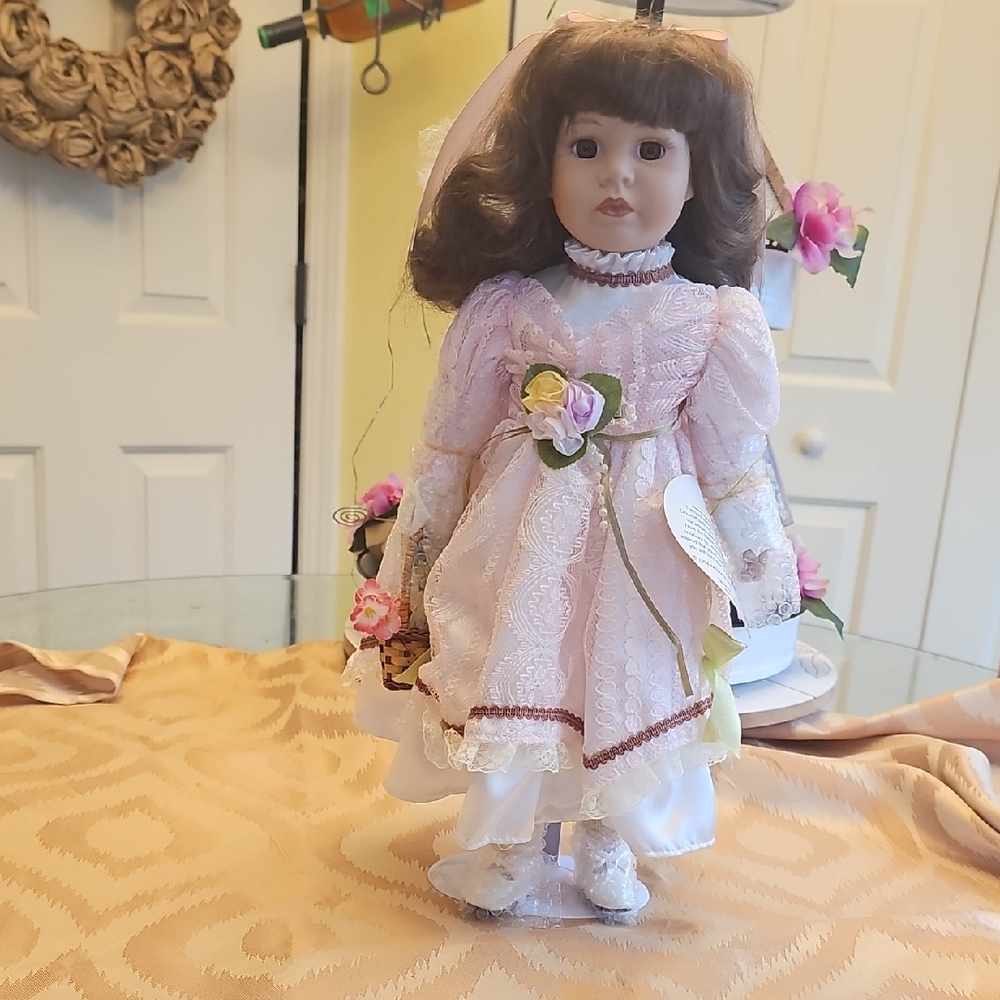 Elegant Pink Porcelain Doll